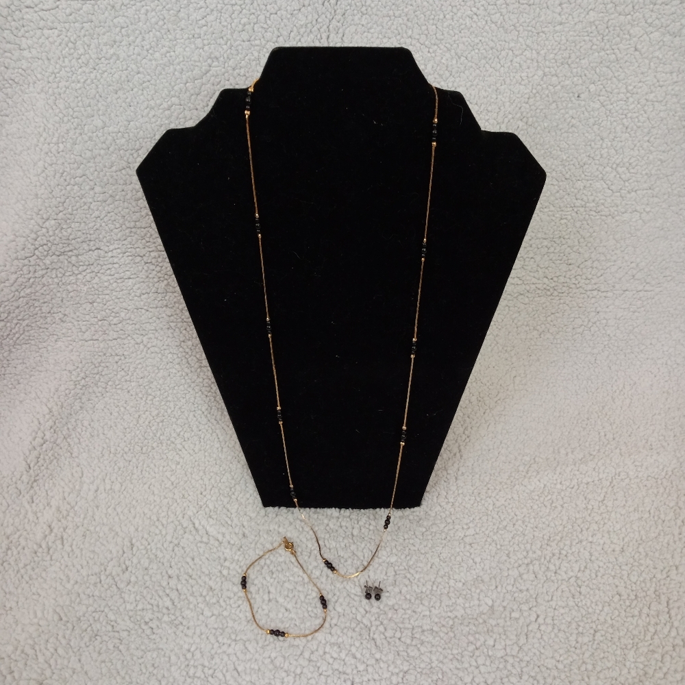 Gold and black necklace, bracelet, & earring set